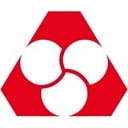 Logo Tyson Foods : Design Hexagonal Rouge et Blanc Logo Tyson Foods : hexagone rouge avec trois cercles blancs imbriqués formant un trèfle géométrique.